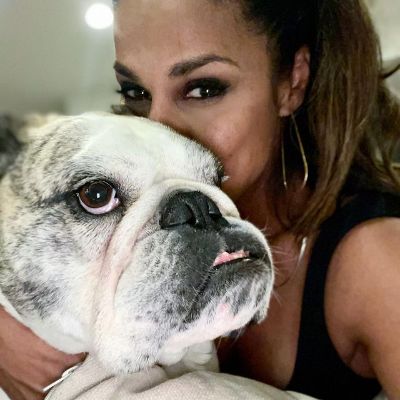 Taniya taking a selfie with her dog.